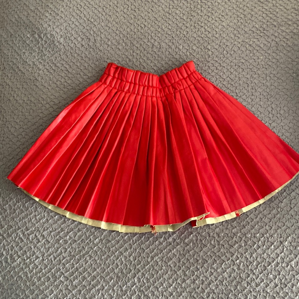 Red pleated pleather skirt